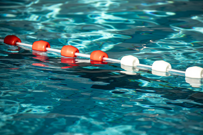 Swimming pool water treatment